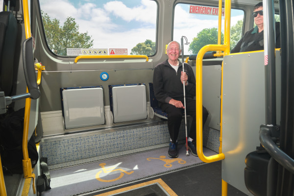 Image of man using the accessible seating on the Route 59.